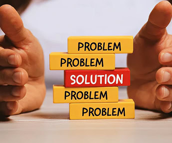 Problem solving concept: Stacked blocks with 'PROBLEM' and a 'SOLUTION' block held by hands, representing issue resolution.